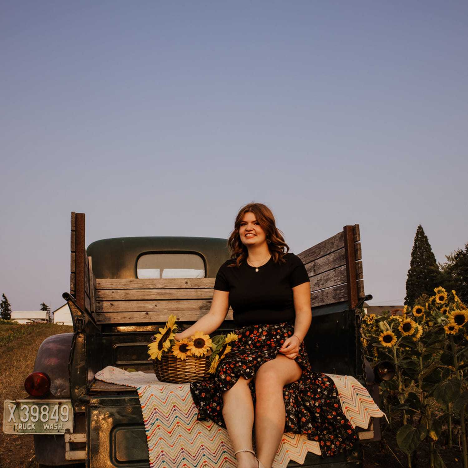 Portrait of Emma, a professional stylist at Moda Organic Salon And Spa, showcasing their expertise and style.